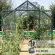 Serre de jardin LAMS Aloé 8,10 m², coloris vert, verre trempé 3 mm, base et descente de gouttière incluses