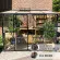 Serre de jardin LAMS Mélissa 3,30 m², coloris gris anthracite, verre trempé 3 mm, base et descente de gouttière incluses